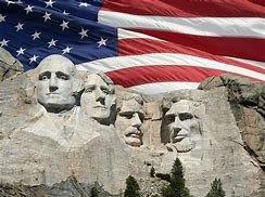 Rushmore with American flag